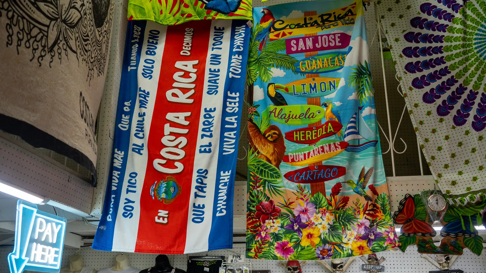 Costa Rica beach towels with local sayings and province maps