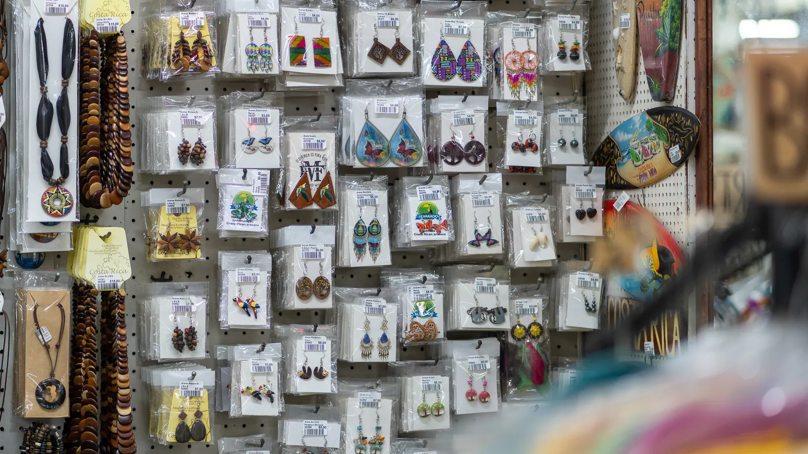 Handmade earrings and necklaces on display