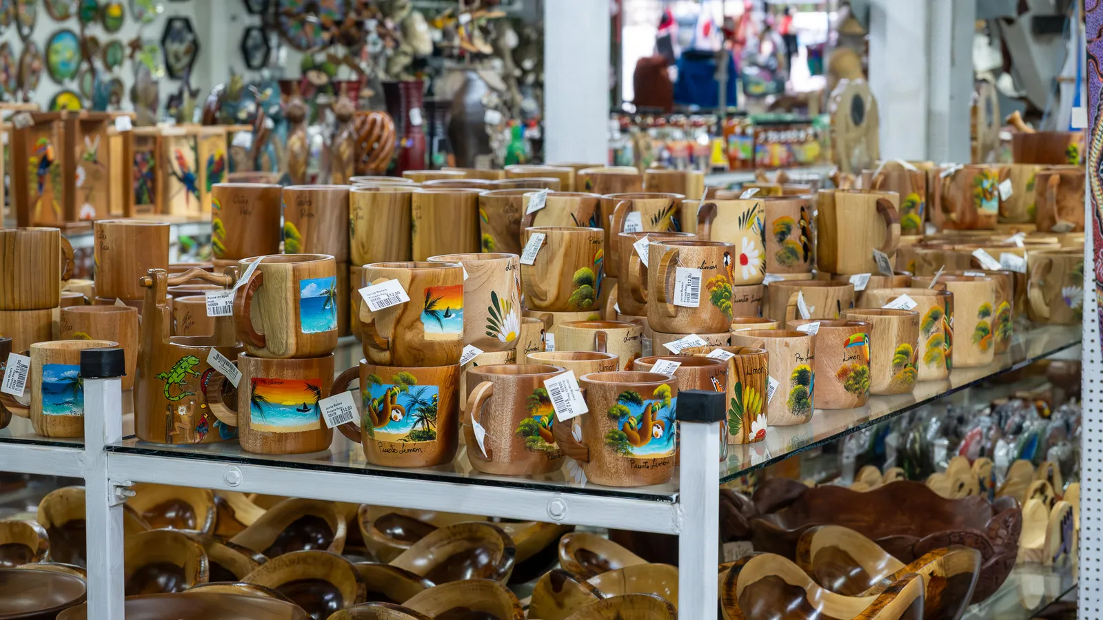Wooden mugs painted with beach scenes